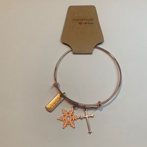 Handmade rose gold stainless steel bracelet with 3 charms.